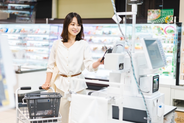 Japanese Convenience Stores Explained: What You Can Do There Contactless card payment at a Japanese convenience store checkout