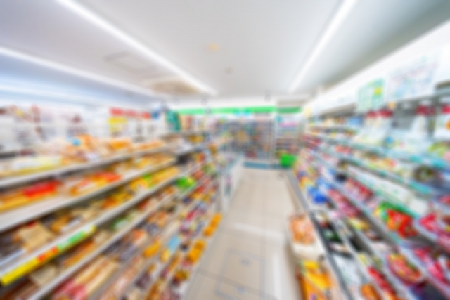 Japanese Convenience Stores Explained: What You Can Do There Customer browsing a Japanese convenience store aisle