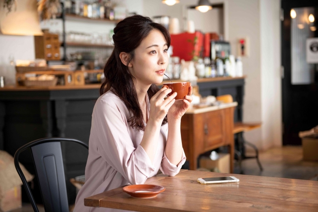 Customers sitting quietly inside a Japanese café