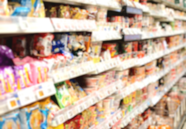 Japanese Drugstores Explained: What Travellers Should Know Traveller browsing Japanese drugstore shelves