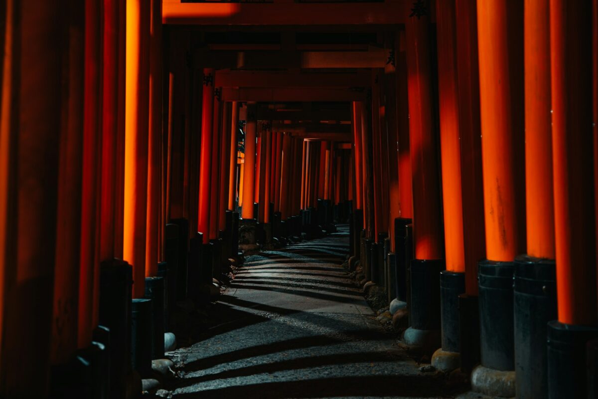 First-Time Japan Trip: What to Know Before You Go (+ Checklist) Red torii gate path at Fushimi Inari shrine in Japan