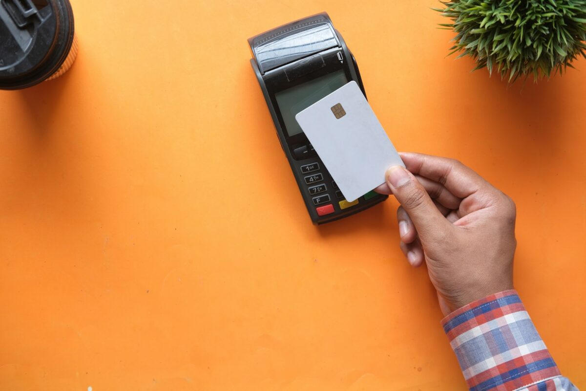 Cash, Cards and IC Cards: How Payments Work in Japan Tapping a contactless card on a payment terminal