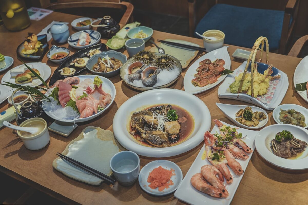 Eating Vegetarian and Vegan in Japan: A Practical Guide An assortment of Japanese dishes on a wooden table