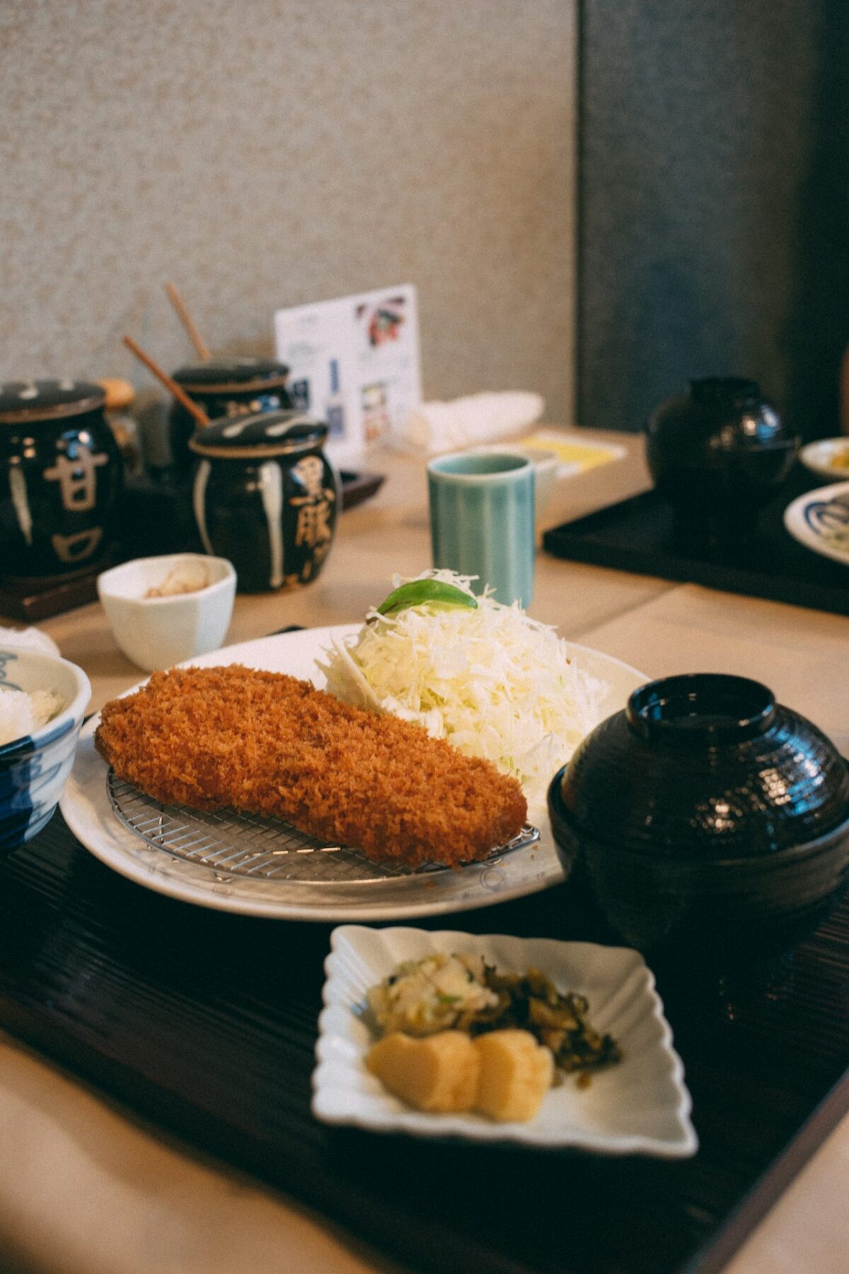 A spread of cooked Japanese dishes on a table
