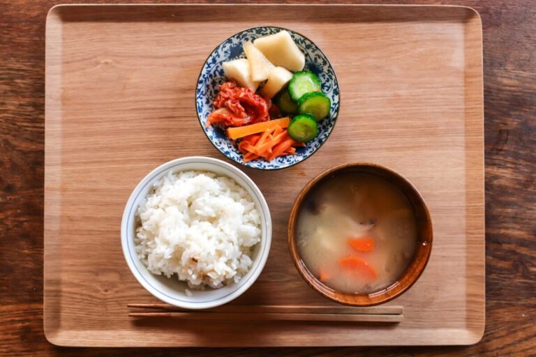 A set of small Japanese dishes served on a tray