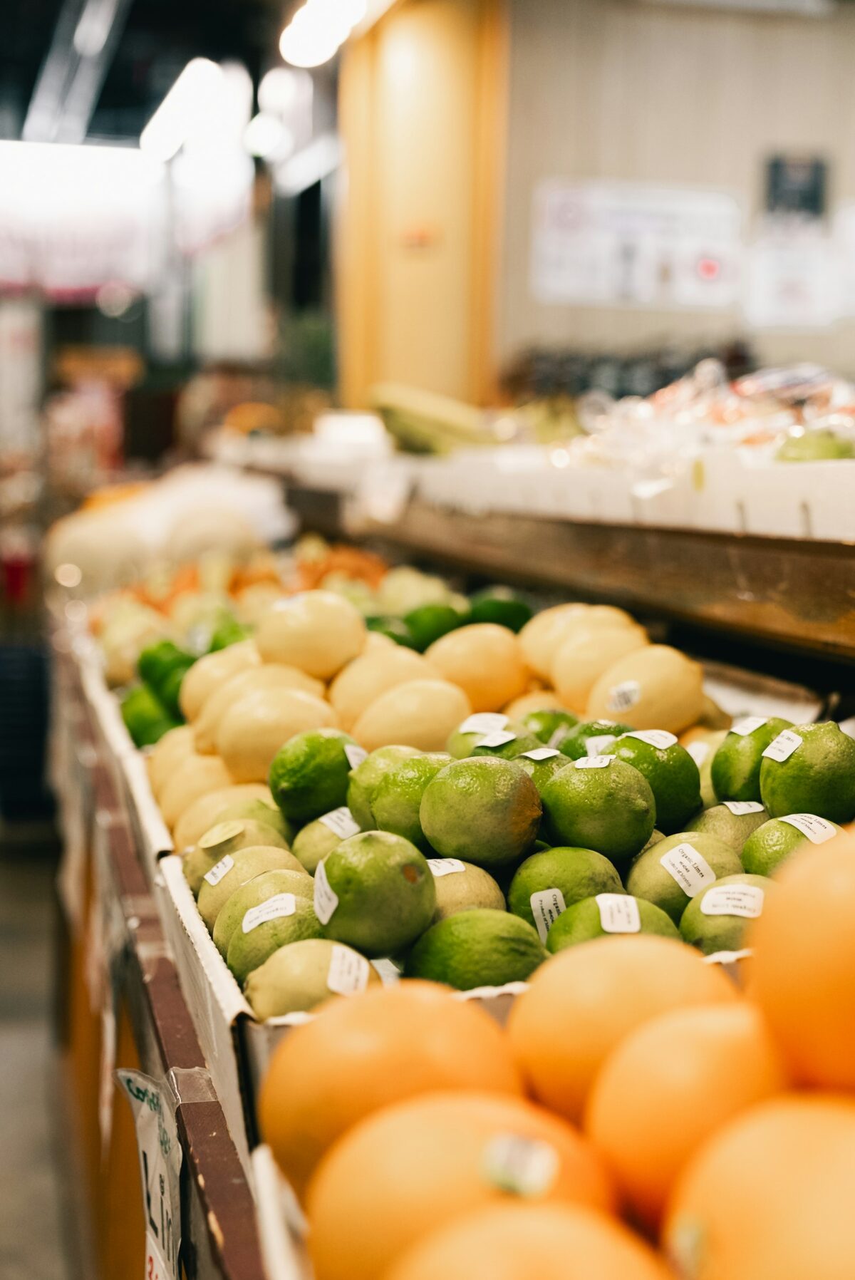 Fresh produce on display in a supermarket aisle