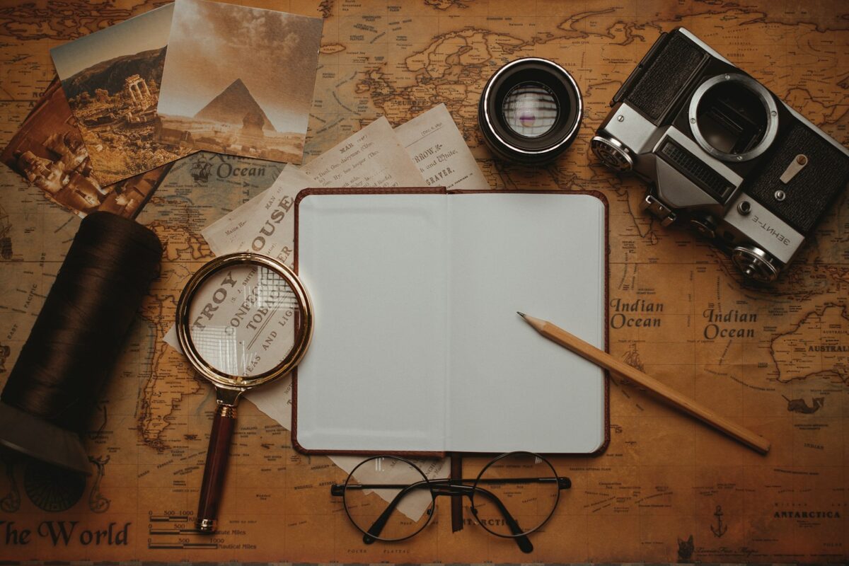 Arriving in Japan: From Airport to Hotel Travel notebook, map and camera for planning a Japan trip