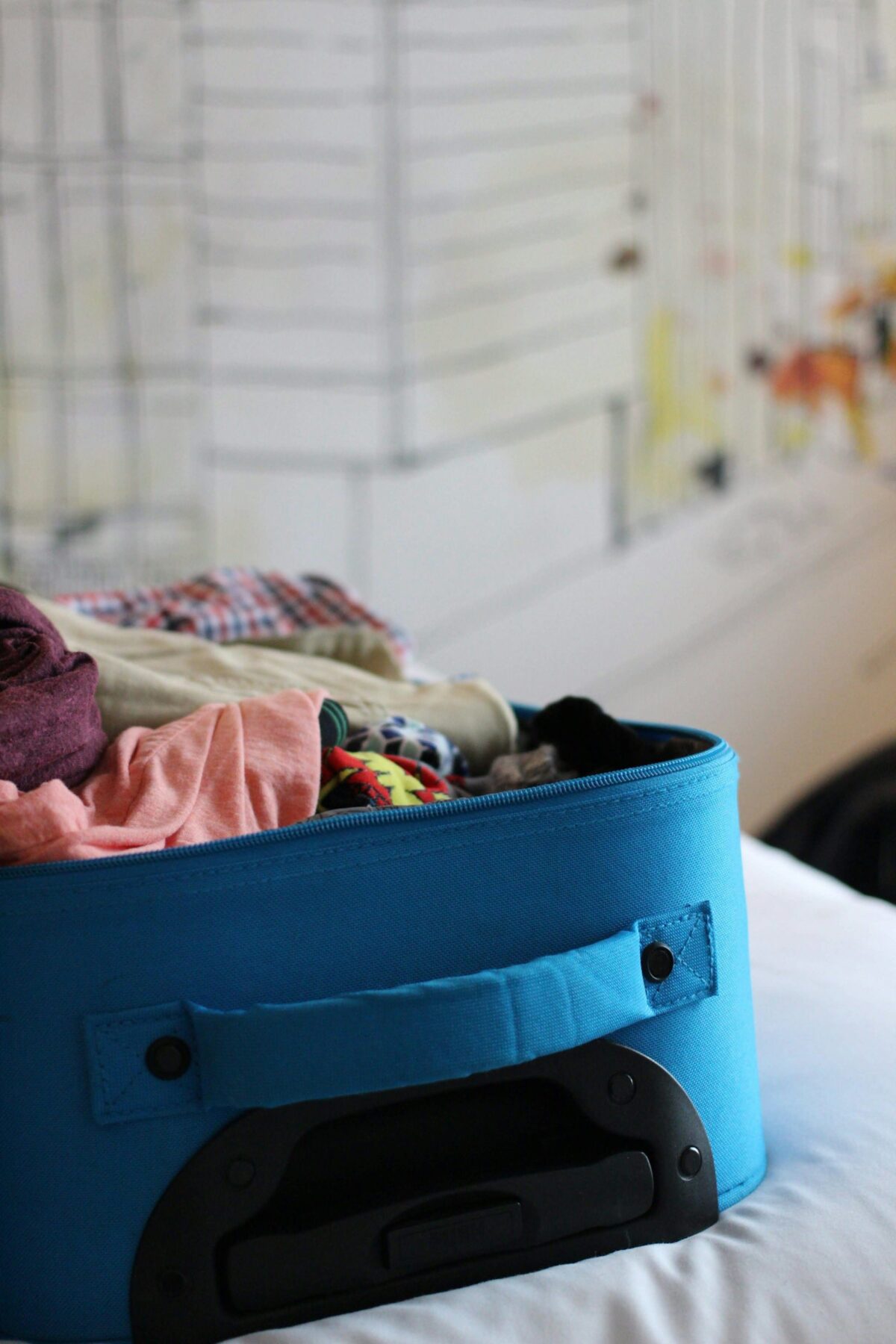 What to Pack for Japan: A UK Traveller's Seasonal Checklist A suitcase filled with neatly folded clothes
